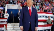 Donald Trump takes the stage during a campaign rally at the J.S. Dorton Arena on Nov. 4, 2024, in Raleigh, North Carolina.