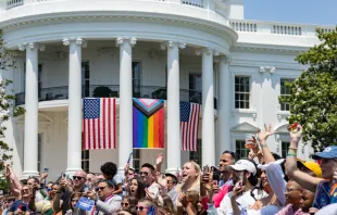 The Progress Pride flag is shown above (center flag) at a White House "Pride" celebration on June 10, 2023. The White House, public domain, via Wikimedia Commons