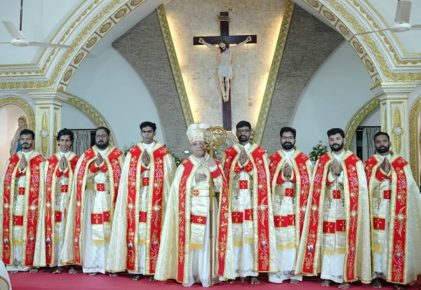 Bishop Bosco Puthur (center) with eight newly ordained priests at the minor seminary chapel of the Ernakulam Archdiocese of the Syro-Malabar Church. Credit: Ernakulam Archdiocese of the Syro-Malabar Church