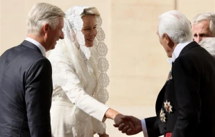 Queen Mathilde of Belgium is one of only a few women in the world who can wear white, rather than the customary black, when meeting the pope for an official private audience at the Vatican. She arrived at the Vatican’s Apostolic Palace with her husband, King Philippe of the Belgians, on Sept. 14, 2023, wearing a white mantilla veil and a white dress. Credit: Daniel Ibañez/CNA