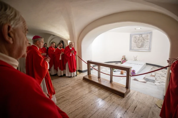 Archbishop Georg Gänswein prays at the tomb of Pope Benedict XVI ahead of the Ratzinger Prize awards ceremony on Nov. 22, 2024, at the Vatican. Credit: Daniel Ibañez/CNA