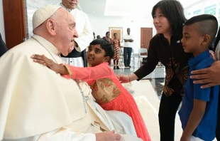 Pope Francis at the apostolic nunciature in Jakarta with refugee children. Credit: Vatican Media