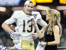 ESPN reporter Molly McGrath interviews Notre Dame quarterback Riley Leonard (13) after NCAA football game action between the Notre Dame Fighting Irish and the Georgia Bulldogs at Caesars Superdome in New Orleans, on Jan. 2, 2025. “First and foremost I want to thank my lord and savior Jesus Christ,” Leonard told the media.