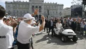 Pope Francis travels between the conference center and Unità d’Italia Square in Trieste, Italy, with a golf cart during his pastoral visit to the northern Italian city on July 7, 2024. In Trieste, the pope addressed around 1,200 participants in a Catholic conference on democracy for the annual Social Week of Catholics.
