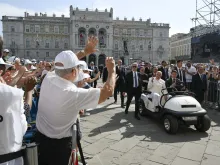 Pope Francis travels between the conference center and Unità d’Italia Square in Trieste, Italy, with a golf cart during his pastoral visit to the northern Italian city on July 7, 2024. In Trieste, the pope addressed around 1,200 participants in a Catholic conference on democracy for the annual Social Week of Catholics.