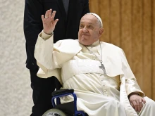 Pope Francis greets pilgrims from his wheelchair during the Saturday jubilee audience in the Vatican’s audience hall on Jan. 11, 2025.