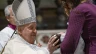 Pope Francis baptizes a baby at the feast of the Baptism of the Lord at the Sistine Chapel, Sunday, Jan. 12, 2025.