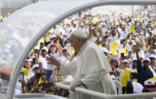 Pope Francis greets the crowd in Bahrain's national soccer stadium before offering Mass on Nov. 5, 2022. Vatican Media