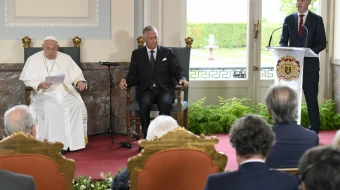 Pope Francis and King Philippe listen to a speech by Belgium Prime Minister Alexander De Croo during the pope’s trip to Belgium in late September 2024.