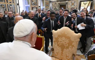 A group of comedians and humorists, including Chris Rock and Jimmy Fallon (center), share a lighthearted exchange with Pope Francis during a gathering with the pope in the Apostolic Palace at the Vatican on June 14, 2024. Credit: Vatican Media