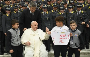 Pope Francis greets pilgrims and poses for photos at the end of his general audience on Nov. 29, 2023. Vatican Media