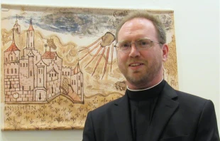 Brother Robert Macke, a Jesuit and astronomer at the Vatican Observatory, works in his office at the Vatican Observatory. Credit: Photo courtesy of Brother Robert Macke