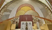 The Knights of Columbus used a paper cover to temporarily cloak artwork created by Father Marko Rupnik at the St. John Paul II National Shrine in Washington, D.C., on Tuesday, July 23, 2024.