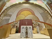 The Knights of Columbus used a paper cover to temporarily cloak artwork created by Father Marko Rupnik at the St. John Paul II National Shrine in Washington, D.C., on Tuesday, July 23, 2024.