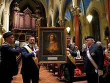 Knights of Columbus process with the new Knights of Columbus Sacred Heart Pilgrim Icon during a Mass and Sacred Heart Holy Hour at St. Mary Church in New Haven, Connecticut, Jan. 3, 2025.