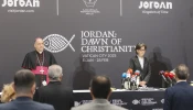 The papal ambassador to Jordan, Archbishop Giovanni Pietro Dal Toso, and Jordanian Minister of Tourism and Antiquities Lina Annab speak at a press conference in Amman, Jordan, about the new exhibit “Jordan: Dawn of Christianity,” which will open at the Vatican on Jan. 31, 2025.