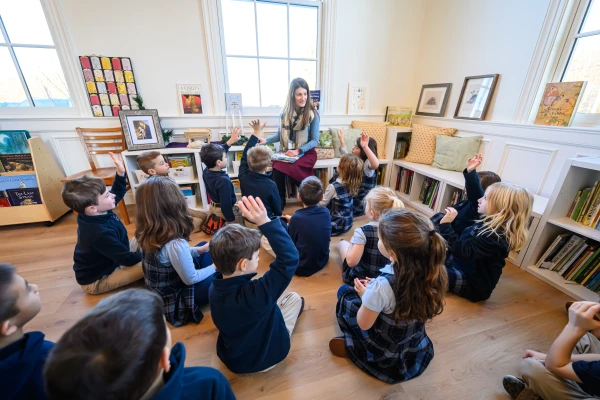 First grade students attend class at St. Benedict Classical Academy on its opening day, Dec. 2, 2024. Credit: Adam Richins Photography.