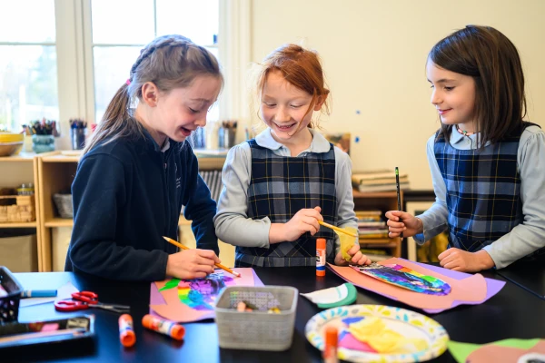 Students work on an art project at St. Benedict Classical Academy on its opening day, Dec. 2, 2024. Credit: Adam Richins Photography