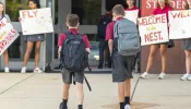 Bishop Ireton High School upperclassmen welcome freshman students on their first day of school for the 2024-2025 phone-free school year.