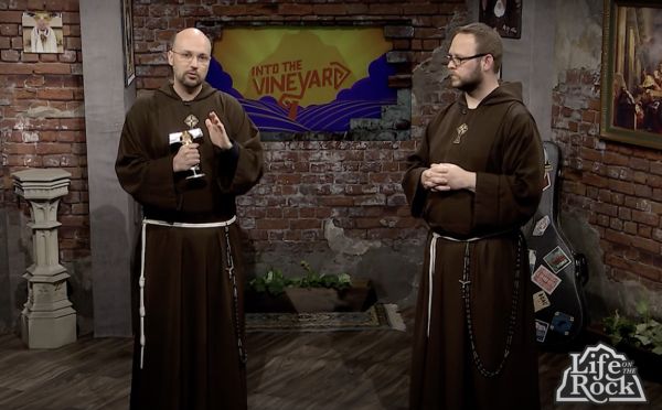 Father John Paul Mary performs a blessing with a relic of St. Maximilian Kolbe's beard on the set of "Life on the Rock." Credit: EWTN/Screenshot