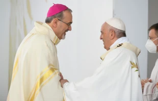 Pope Francis greets Latin Patriarch Pierbattista Pizzaballa of Jerusalem at a Mass at the GSP Stadium in Nicosia, Cyprus, Dec. 3, 2021. Vatican Media.