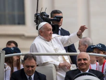 Pope Francis greets pilgrims at his general audience at the Vatican on Wednesday, Oct. 16, 2024.