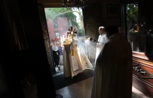 Bishop Robert J. Brennan of Brooklyn holds the Eucharist as he enters Our Lady of Lebanon Maronite Cathedral in Brooklyn, New York, on May 26, 2024. The visit was part of the New York leg of the National Eucharistic Pilgrimage. Credit: Jeffrey Bruno/CNA
