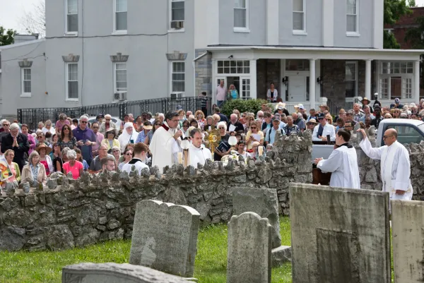 The procession stops to pray at a cemetery in Emmitsburg, Maryland, on June 6, 2024. Credit: Jeffrey Bruno