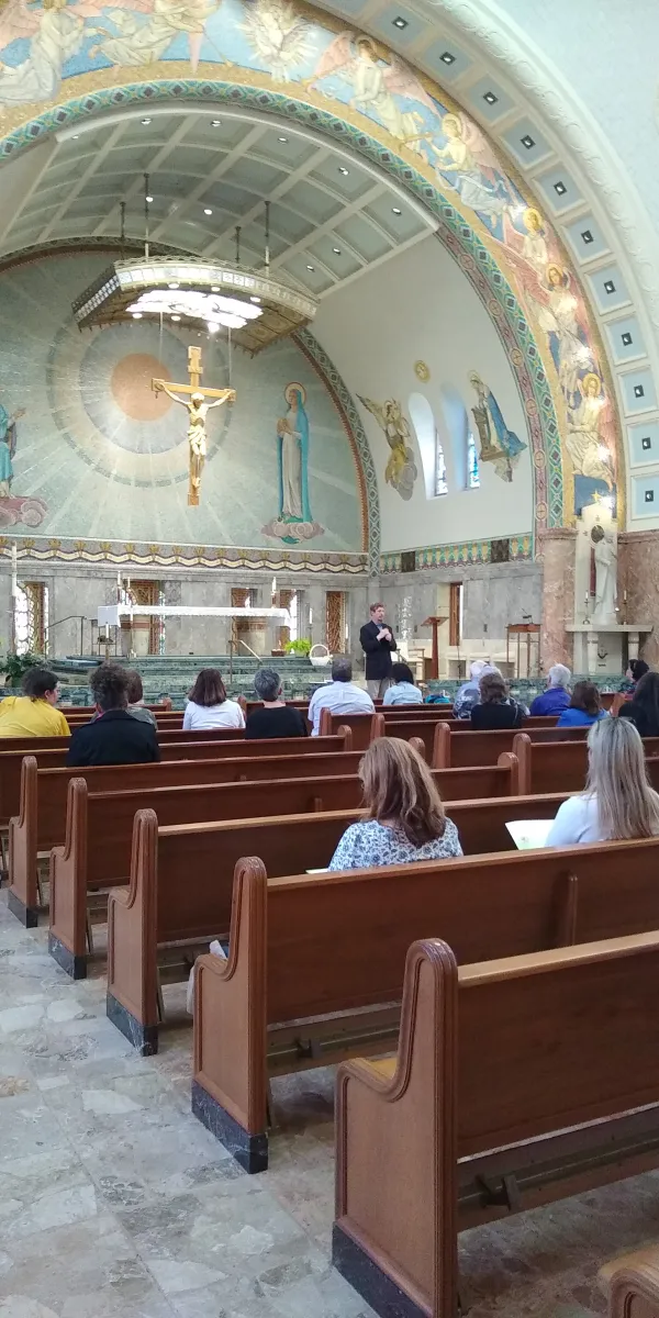 Participants in the Mental Wellness Retreat at the National Shrine of St. Elizabeth Ann Seton in Emmitsburg, Maryland, listen to a reflection at the shrine’s basilica. Credit: Seton Shrine