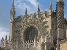 Window at the top of the south façade of the Cathedral in Seville, Spain,.