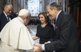 Pope Francis greets House Speaker Nancy Pelosi and Paul Pelosi in St. Peter's Basilica after Mass on June 29, 2022. Vatican Media