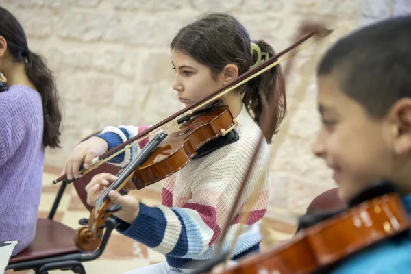 Some young violin students from the Magnificat Institute during rehearsals for a concert in May 2024. Credit: Photo courtesy of Silvia Giuliano/Custody of the Holy Land
