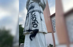 The statue of the patron saint of St. Francis de Sales Parish in Sherman Oaks has been vandalized three times total in September and August. The vandalism in the photograph is being investigated as a “hate crime” by local police, according to the church's pastor. Credit: Photo courtesy of Father Michael Wakefield