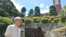 Catholic Shigemi Fukahori stands in front of the former bell tower of the Urakami Cathedral in Nagasaki, Nagasaki Prefecture, on July 17, 2013.