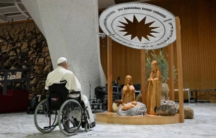 Pope Francis stops for a brief prayer in front of the Bethlehem Nativity in the Vatican's Paul VI Hall during its presentation and a meeting with some of the people involved in its creation on Dec. 7, 2024. Credit: Vatican Media