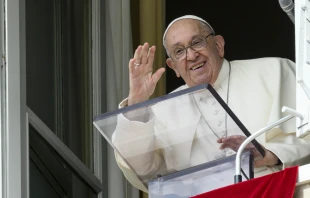 Pope Francis waves from a window of the Apostolic Palace at the crowds gathered in St. Peter's Square for his weekly Angelus address on Sunday, Sept. 22, 2024. Credit: Vatican Media