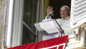 Pope Francis waves to pilgrims gathered in St. Peter's Square for his Angelus reflection on Oct. 6, 2024.