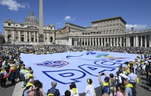 Members of ACLI (Italian Christian Workers' Associations) hold a sign with the word "peace" in Italian, in St. Peter's Square on June 1, 2024. Credit: Vatican Media