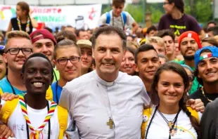 The 10th successor of St. Don Bosco to the Salesians, Cardinal Ángel Fernández Artime, along with young people from the Salesians. | Credit: ANS-Salesians
