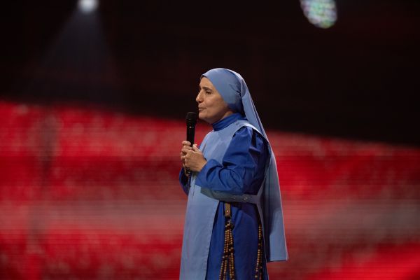 Mother Olga of the Sacred Heart recounts her experiences with the healing power of the Eucharist at the National Eucharistic Congress in Indianapolis on July 18, 2024. Credit: Jeffrey Bruno