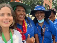 Socorro Vázquez (left) together with Indonesian friends prior to attending a papal Mass in Jakarta, Indonesia.