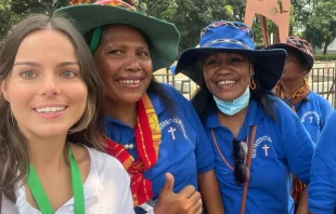 Socorro Vázquez (left) together with Indonesian friends prior to attending a papal Mass in Jakarta, Indonesia. Credit: Photo courtesy of Socorro Vázquez