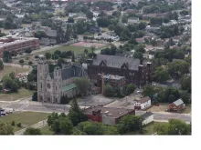 Aerial view of Buffalo, New York, with a focus on St. Ann's Roman Catholic Church (left).