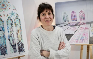 French artist Claire Tabouret poses following a press conference after winning with The Atelier Simon-Marq, the selection to create new stained-glass windows in six chapels of the south aisle of the Notre-Dame de Paris cathedral in Paris on Dec. 18, 2024. Credit: STEPHANE DE SAKUTIN/AFP via Getty Images