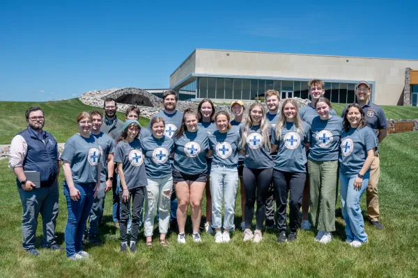 SURVE students at the University of Mary take time for a group photo after daily mass and a barbecue lunch on campus. Margaret Talafuse is pictured in the front row, second from left. Credit: Tom Ackerman/University of Mary