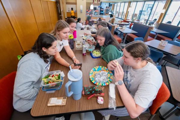 Students of the SURVE University of Mary enjoy each other's company during lunch after the daily mass. Credit: Mike McCleary/University of Mary