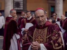 Ralph Fiennes as Cardinal Lawrence in the film “Conclave,” which opens in theaters Oct. 25, 2024, in the U.S.