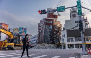 A person walks past an area of a damaged building that is cordoned off following a 7.5-magnitude earthquake on April 3, 2024, in Hualien, Taiwan. Credit: Annabelle Chih/Getty Images