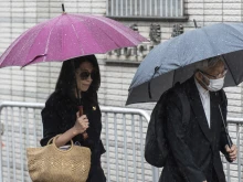 Jimmy Lai’s wife, Teresa (left), and retired Chinese Cardinal Joseph Zen Ze-Kiun arrive at the West Kowloon Magistrates’ Courts to attend Hong Kong activist publisher Lai’s national security trial in Hong Kong on Wednesday, Nov. 20, 2024.