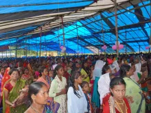 The faithful gather at the site of Father Arul Das' death in the Jamboni jungle on Sept. 2, 2024.